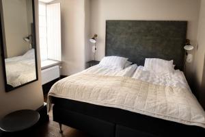 Postel nebo postele na pokoji v ubytování Hotell Visby Börs