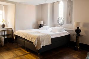 Postel nebo postele na pokoji v ubytování Hotell Visby Börs