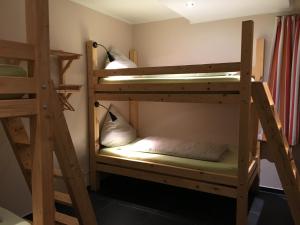 Postel nebo postele na pokoji v ubytování B&B Alte Sägemühle Schlommefurth