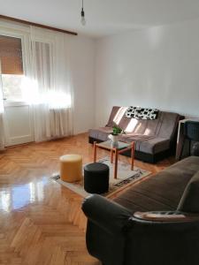 Зона вітальні в Apartman KIKA