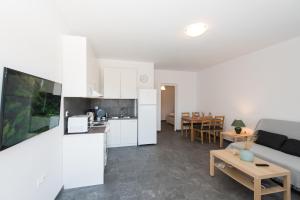 Kuchyň nebo kuchyňský kout v ubytování A&A House Mykonos B