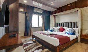 Ліжко або ліжка в номері Hotel Shree Daan