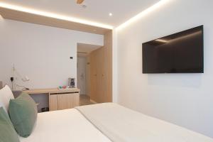 TV a/nebo společenská místnost v ubytování Hotel MiM Mallorca & Spa - Adults Only