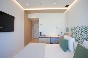 TV a/nebo společenská místnost v ubytování Hotel MiM Mallorca & Spa - Adults Only