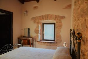 Postel nebo postele na pokoji v ubytování B&B Le Fate