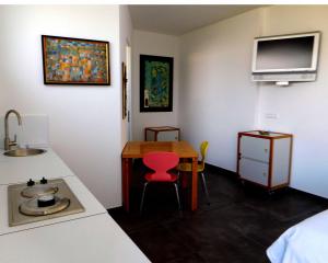 TV a/nebo společenská místnost v ubytování Scherer Living + 2 fotografie