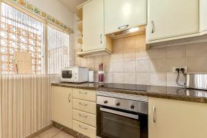 Kuchnia lub aneks kuchenny w obiekcie Apartamentos la Mar