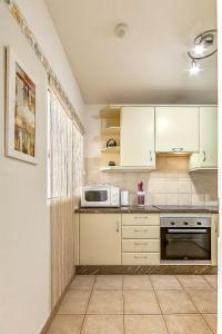 Kuchnia lub aneks kuchenny w obiekcie Apartamentos la Mar