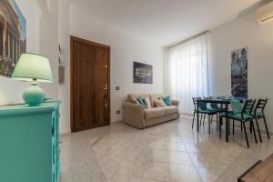A seating area at San Giovanni Apartment with Balcony