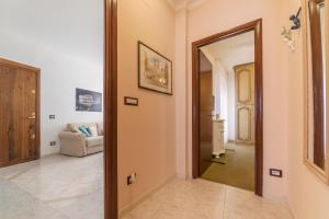 A bed or beds in a room at San Giovanni Apartment with Balcony
