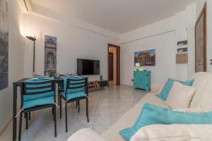 A television and/or entertainment centre at San Giovanni Apartment with Balcony