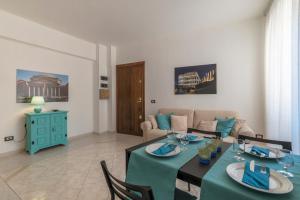 A seating area at San Giovanni Apartment with Balcony
