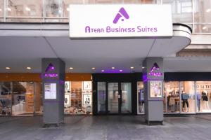 a store front of a shopping mall with a sign on it at Atera Business Suites in Belgrade