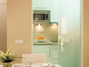 A kitchen or kitchenette at Misterhost San Bernardo Jardines de Murillo
