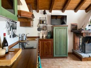 Kuchyň nebo kuchyňský kout v ubytování Apartment Casa Alba + 17 fotografií