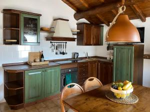 Kuchyň nebo kuchyňský kout v ubytování Apartment Casa Alba