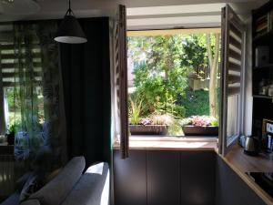 Vonkajšia záhrada v ubytovaní Apartament Skrytka