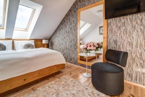 Posteľ alebo postele v izbe v ubytovaní Hotel Na Rozcestí