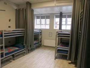 
a row of bunk beds in a room at Abbey Court Hostel in Dublin
