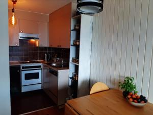 Η κουζίνα ή μικρή κουζίνα στο The fox's family home - Veysonnaz +20 φωτογραφίες