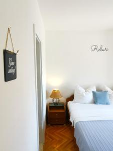 
Een bed of bedden in een kamer bij Villa Mira
