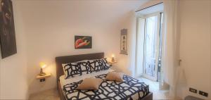 A bed or beds in a room at FraBa Apartment