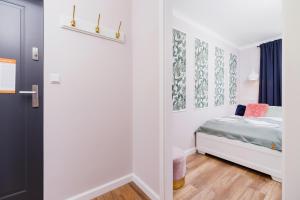 Posteľ alebo postele v izbe v ubytovaní Apartament przy Bulwarach Wiślanych Kościuszki by Noclegi Renters