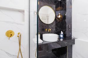 Kúpeľňa v ubytovaní Apartament przy Bulwarach Wiślanych Kościuszki by Noclegi Renters