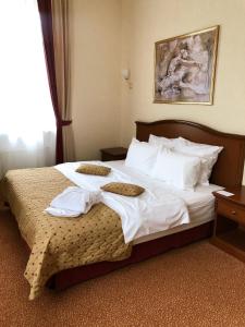 Кровать или кровати в номере Селект Отель Павелецкая