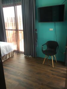 Een TV en/of entertainmentcenter bij Penghu Little Apple B&B
