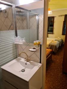 Posteľ alebo postele v izbe v ubytovaní Nikolas Rooms