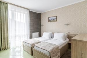 Postel nebo postele na pokoji v ubytování Hotel Adrenalin + 37 fotografií