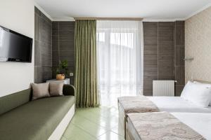 Voodi või voodid majutusasutuse Hotel Adrenalin toas