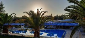 The swimming pool at or close to Pension Nychterida