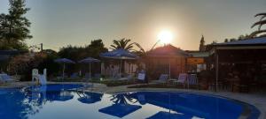 The swimming pool at or close to Pension Nychterida