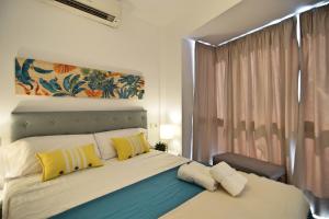 Ein Bett oder Betten in einem Zimmer der Unterkunft Coqueto apartamento a 5min. del centro histórico