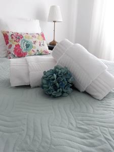 Postel nebo postele na pokoji v ubytování Vivenda Privada - Monte Vistoso - Duna Parque Group