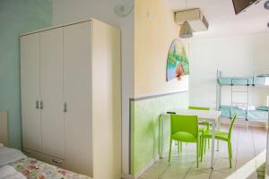 Postel nebo postele na pokoji v ubytování Hotel del Sole