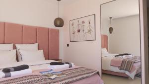 Ένα ή περισσότερα κρεβάτια σε δωμάτιο στο Katsoleil