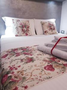 Postel nebo postele na pokoji v ubytování Il Sogno Torino Guesthouse