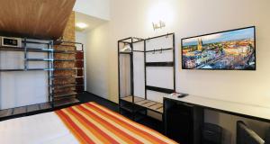 TV a/nebo společenská místnost v ubytování Best Western Airport Hotel Stella