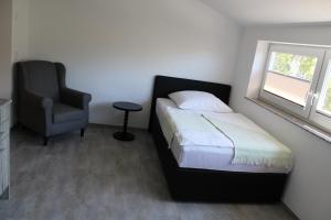Postel nebo postele na pokoji v ubytování Business Apartment Turgi