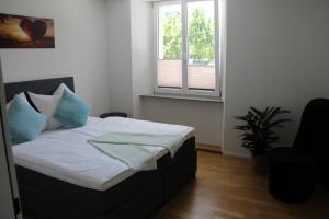 Postel nebo postele na pokoji v ubytování Business Apartment Turgi