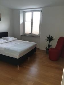 Postel nebo postele na pokoji v ubytování Business Apartment Turgi