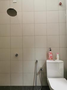 Ett badrum på Damai Homestay Alor Setar