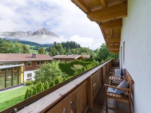 a balcony with a view of a mountain at Appartement Zirbe in Ellmau