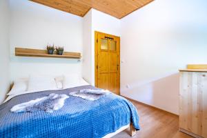 Postel nebo postele na pokoji v ubytování Pod Miloňovou