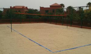 Tenis alebo squash v ubytovaní Tamarindo I Piscinas de Agua Salada alebo jeho okolí