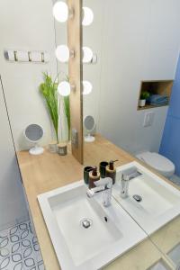 Kúpeľňa v ubytovaní Sherlock Apartment