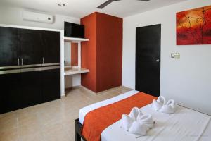 Postel nebo postele na pokoji v ubytování Gayser Apartamentos